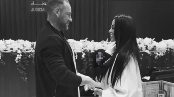 Katie Price skips bridal glam for casual look at wedding to Lee Andrews