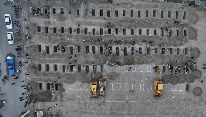 Graves are being prepared for the victims following a reported strike on a school in Minab, Iran, March 2, 2026. — Reuters