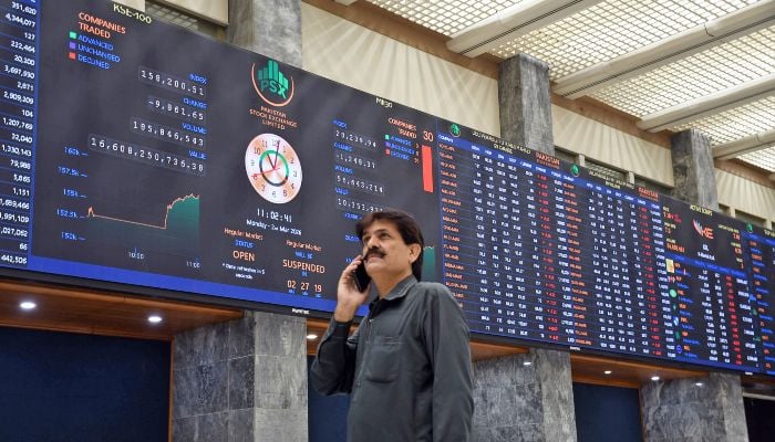 A trader monitors stock prices at the Pakistan Stock Exchange (PSX) in Karachi, March 2, 2026. — Online