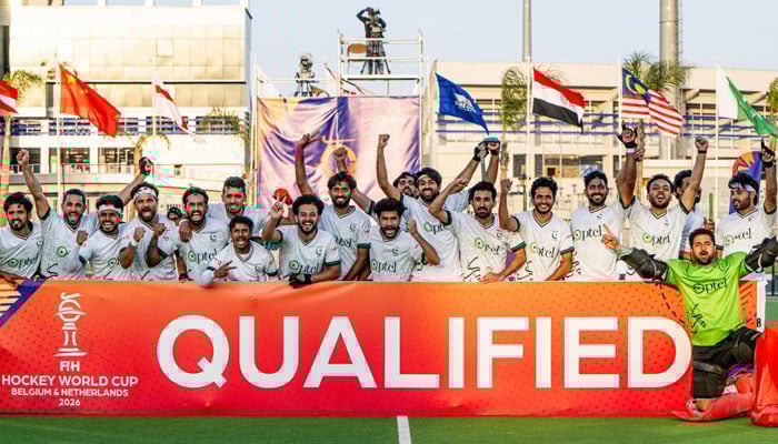 Pakistan players celebrate qualifying for the FIH Hockey World Cup 2026 after beating Japan in the semi-final of the Qualifiers at the SCA Hockey Stadium in Ismailia on March 6, 2026. — FIH