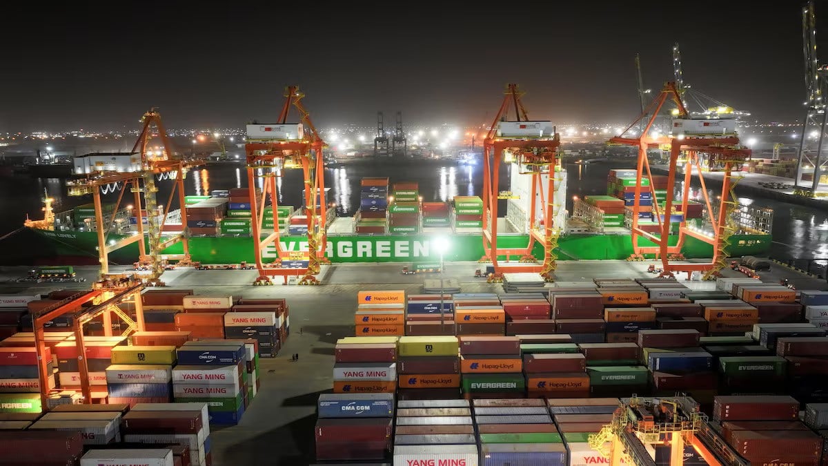 A drone view of an Evergreen container ship docked at the port of Umm Qasr during nighttime operations in Basra, Iraq, March 5, 2026. — Reuters