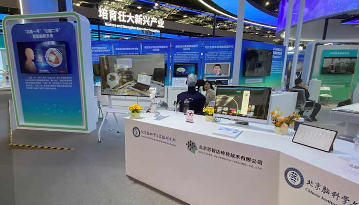 Chinese Institute for Brain Research, Beijing and NeuCyber Neurotech (Beijing) Co. Ltd host a booth displaying their brain chips at the Zhongguancun Forum in Haidian district, Beijing, China. — Reuters/File