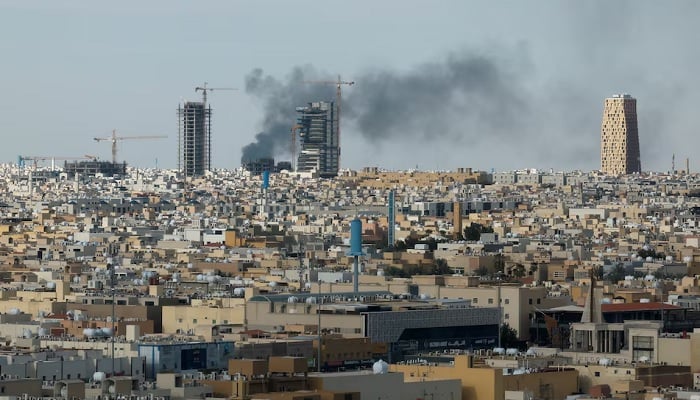 Smoke rises above the city, amid the U.S.-Israeli conflict with Iran, in Riyadh, Saudi Arabia, March 5, 2026. — Reuters