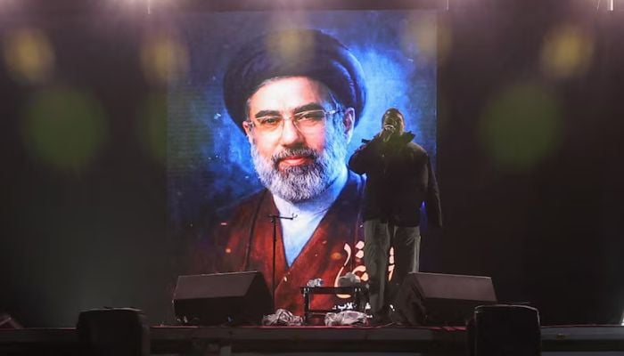A picture of Irans new supreme leader, Mojtaba Khamenei, is displayed on a screen in Tehran, March 9, 2026. — Reuters
