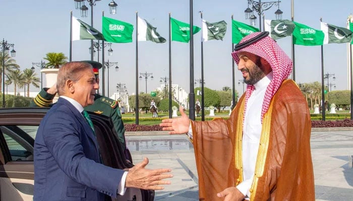 Saudi Crown Prince Mohammed bin Salman greets Prime Minister Shehbaz Sharif in Riyadh, Saudi Arabia, September 17, 2025. — Reuters