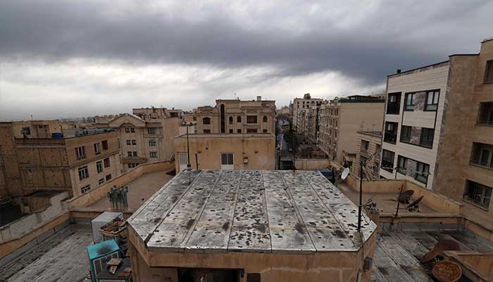The roof of a house is seen covered with soot after overnight strike on the Tehran Oil Refinery in Tehran on March 8, 2026. — AFP
