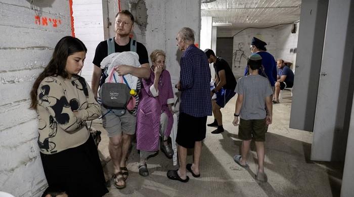 Shelter rankings and shower-timing apps: Israelis, Palestinians adjust to Iranian rockets