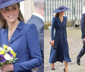 Kate steals the spotlight in 80s-inspired navy dress holding flowers