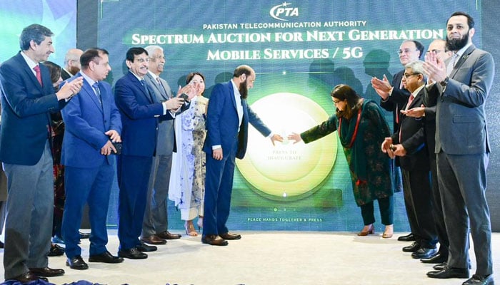 IT Minister Shaza Fatima and PTA Chairman Hafeez Ur Rehman commence the Spectrum Auction for Next Generation Mobile Services in Islamabad on March 10, 2026. — X@MoitOfficial