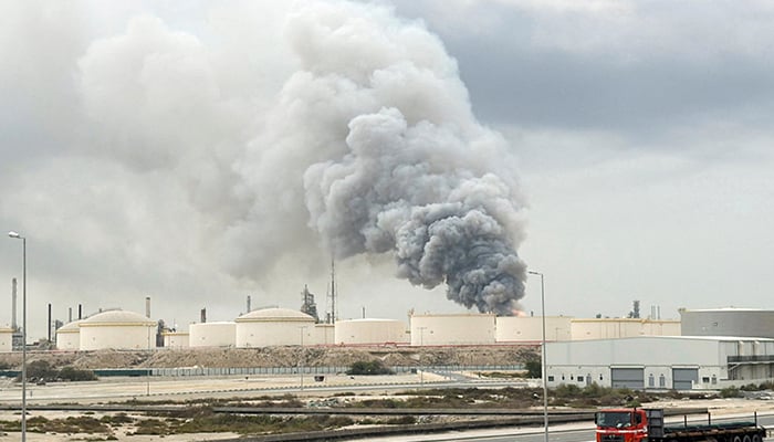 Smoke rises following a strike on the Bapco Oil Refinery, amid the US-Israeli conflict with Iran, on Sitra Island Bahrain, March 9, 2026. — Reuters