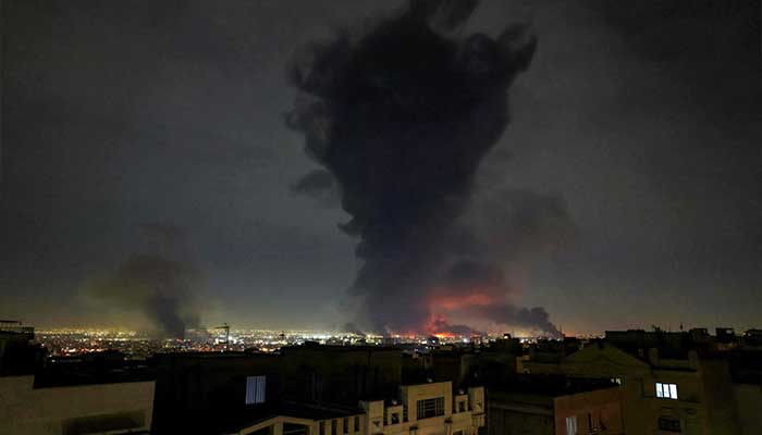 Smoke rises from the site of airstrikes at Mehrabad International Airport in Tehran on March 7, 2026. — AFP