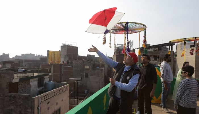 A man flies a kite from a rooftop to mark Basant, a kite-flying festival, in Lahore on February 6, 2026. — Reuters