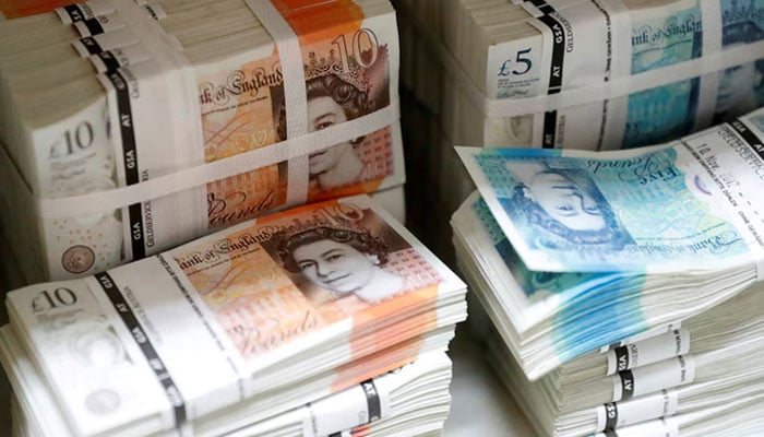 Wads of British Pound Sterling banknotes are stacked in piles at the Money Service Austria companys headquarters in Vienna, Austria, November 16, 2017. — Reuters