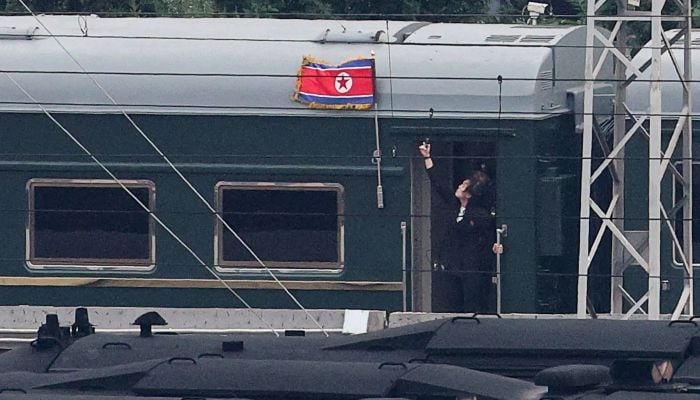 A North Korean flag flutters from a train believed to be carrying North Korean leader Kim Jong Un, as it arrives in Beijing, China, September 2, 2025. — Reuters