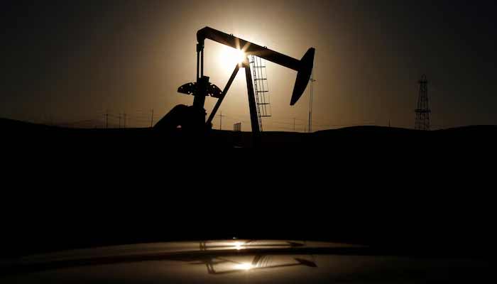 A pump jack is seen at sunrise near Bakersfield, California.— Reuters/File