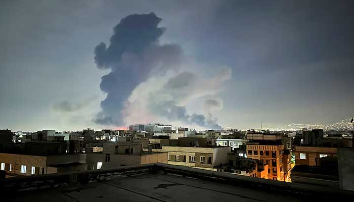 Smoke rises following an explosion, amid the U.S.-Israeli conflict with Iran, in Tehran, Iran, March 7, 2026. Picture taken with a mobile phone. — Reuters