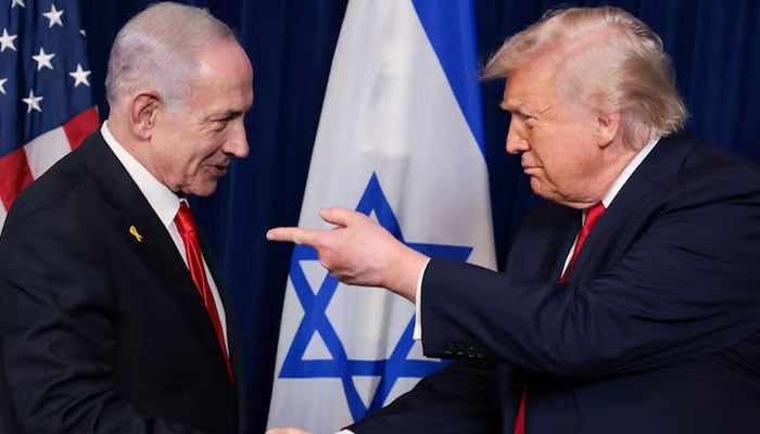 US President Donald Trump points his finger towards Israeli Prime Minister Benjamin Netanyahu as they shake hands during a press conference after meeting at Trump’s Mar-a-Lago club in Palm Beach, Florida on December 29, 2025. — Reuters