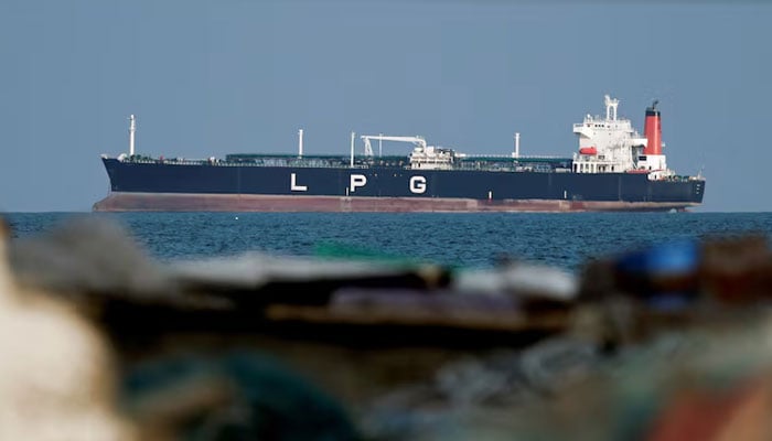 An LPG gas tanker at anchor as traffic is down in the Strait of Hormuz, amid the ٗص-Israeli conflict with Iran, in Shinas, Oman, March 11, 2026. — Reuters