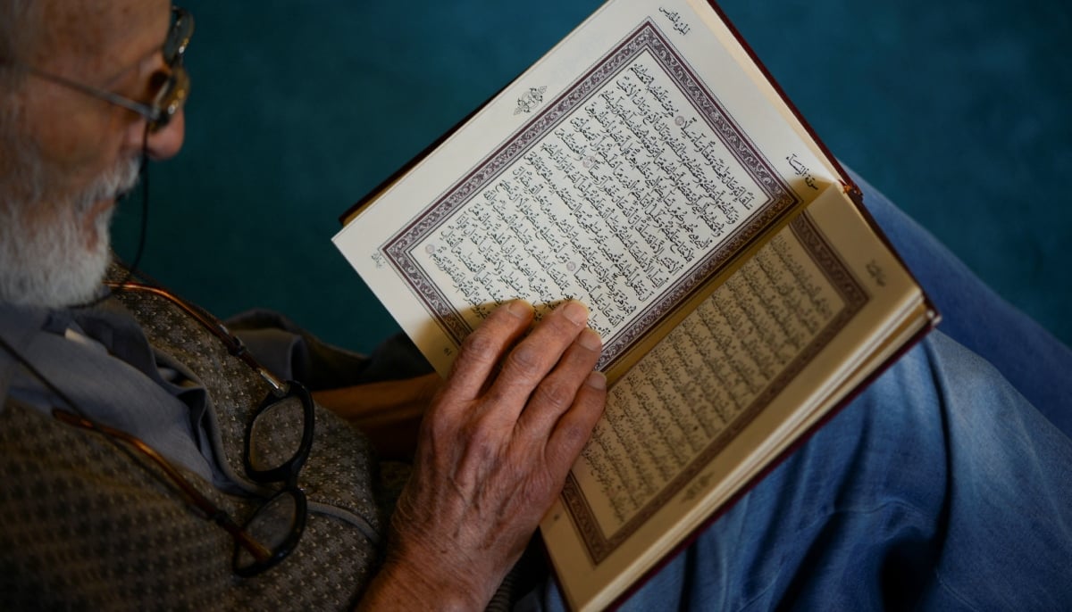 A Muslim man reads the Quran in a mosque during the holy fasting month of Ramadan in Benghazi, Libya February 22, 2026. — Reuters
