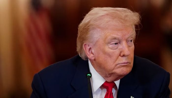 US President Donald Trump looks on during a round table on collegiate sports in the White House in Washington, DC, March 6, 2026. — Reuters