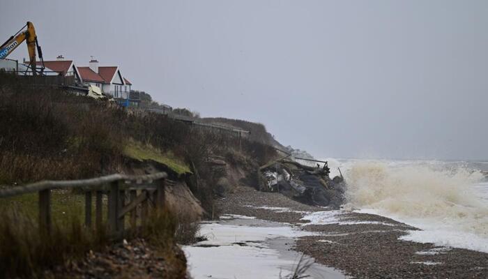 Rough sea near the coastline in an English seaside village of North Norfolk. — AFP
