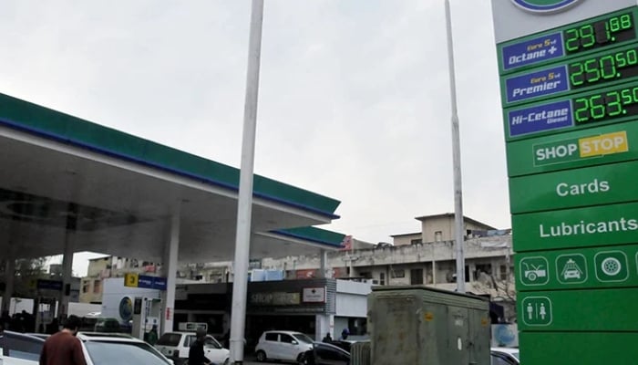 New rate list of fuel prices displayed after an increase in petroleum prices in Islamabad. — APP/File