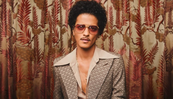 Bruno Mars rises to the top of charts with more new releases