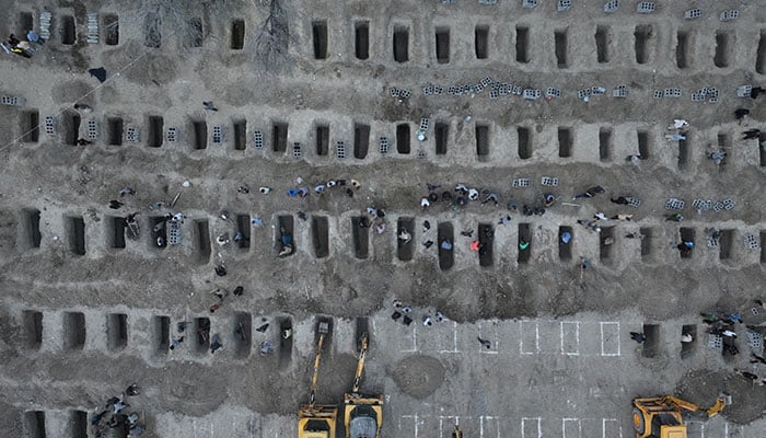 Graves are being prepared for the victims following a reported strike on a school in Minab, Iran on March 2, 2026. — Reuters