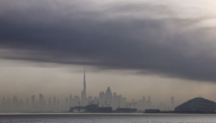 Smoke is seen above Dubai on March 13, 2026. — AFP