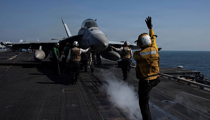 An EA-18G Growler prepares to launch from the flight deck of the US Navy Nimitz-class aircraft carrier USS Abraham Lincoln in support of the Operation Epic Fury attack on Iran from an undisclosed location on March 7, 2026. — Reuters