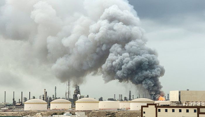 Smoke rises following a strike on the Bapco Oil Refinery, amid the US.-Israeli conflict with Iran, on Sitra Island Bahrain, March 9 on 2026. — Reuters