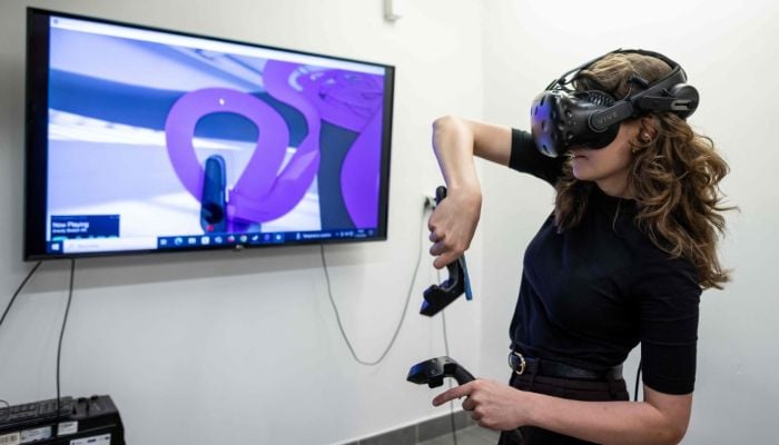 Zuzanna Franczak - assistant instructor at the Experimental Design Studio, presents how to design jewellery with the use of Virtual Reality technology at the Academy of Fine Arts in Gdansk, Poland, on March 11, 2026. — AFP