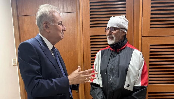 This image shows Anil Dhanak with Amitabh Bachchan. — Reporter