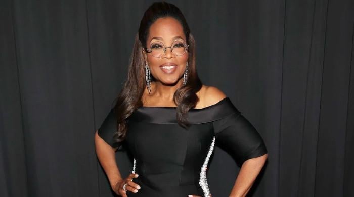 Oprah Winfrey claps back at trolls over viral Paris Fashion Week walk 