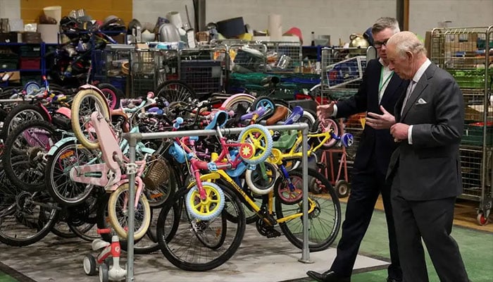 King Charles visits Renew Hub where old bikes get back on road