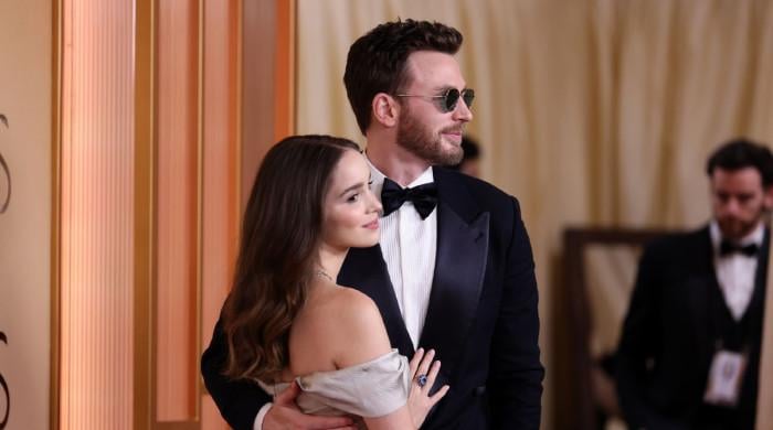 Chris Evans, wife Alba Baptista channel parenthood at Oscars 2026