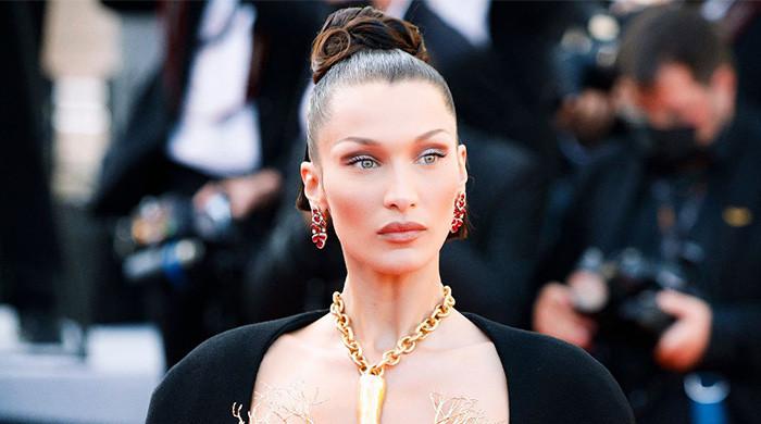 Bella Hadid keeps cool after wardrobe malfunction at Vanity Fair Oscar party