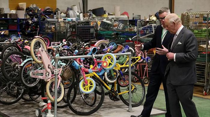 King Charles visits Renew Hub where old bikes get back on road