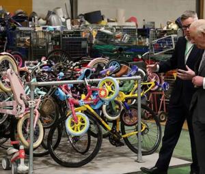 King Charles visits Renew Hub where old bikes get back on road