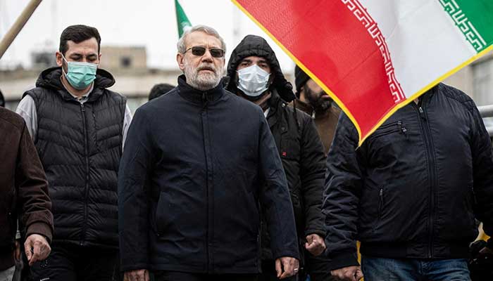 Iranian security chief Ali Larijani takes part in a pro-government rally in Tehran, Iran, March 13, 2026. — Reuters