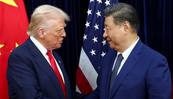 US President Donald Trump (left) shakes hands with Chinese President Xi Jinping as they hold a bilateral meeting at Gimhae International Airport, on the sidelines of the Asia-Pacific Economic Cooperation (APEC) summit, in Busan, South Korea, October 30, 2025. — Reuters