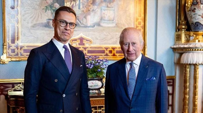 King Charles and Finland's president explore wooden future together 