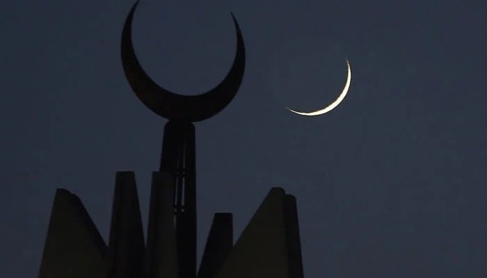 New crescent is seen in the sky in the background of a mosques minaret in this undated image. — AFP/File