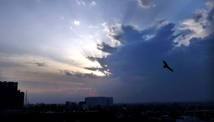 An eye catching view of sunset after downpour in Karachi, March 19, 2026. — APP
