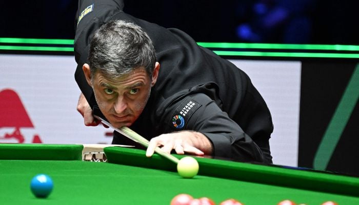 Britains Ronnie OSullivan plays a shot against compatriot Joe OConnor in round 1 of the Snooker World Grand Prix 2026 in Hong Kong on February 4, 2026. — AFP
