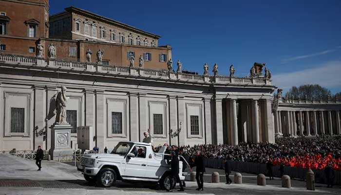 Pope Leo XIV arrives to hold the weekly general audience in Saint Peters Square at the Vatican, March 18, 2026. — Reuters