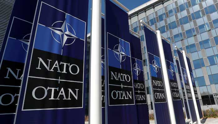 Banners displaying the Nato logo are placed at the entrance of new Nato headquarters during the move to the new building, in Brussels, Belgium April 19, 2018. — Reuters