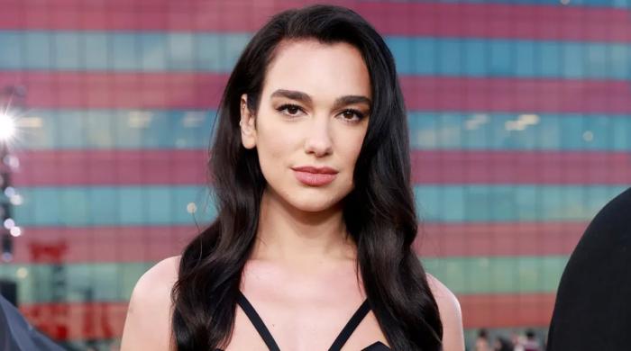 Dua Lipa pouts with director pal after locking major deal