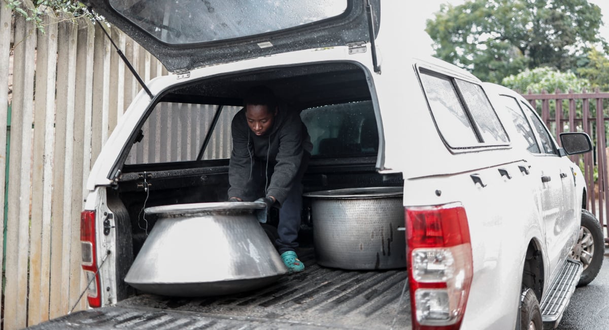 A volunteer from the Muslim Ziaee Institute South Africa (ZISA) prepares for a charity drive in the Fietas district in Johannesburg on the occasion of the Eid ul Fitr at the end of the Muslim fasting month of Ramadan, on March 21, 2026. — AFP