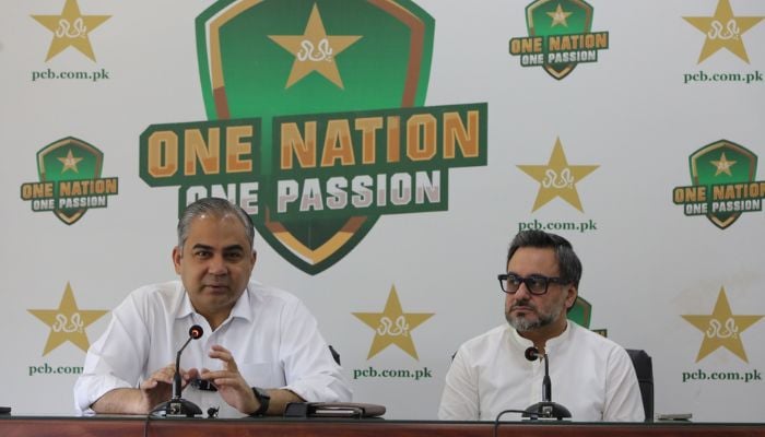 Pakistan Cricket Board (PCB) Chairman Mohsin Naqvi (left) addressing a press conference in Lahore on March 22, 2026. — PCB